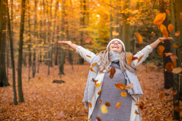 Girl walking in the park in autumn